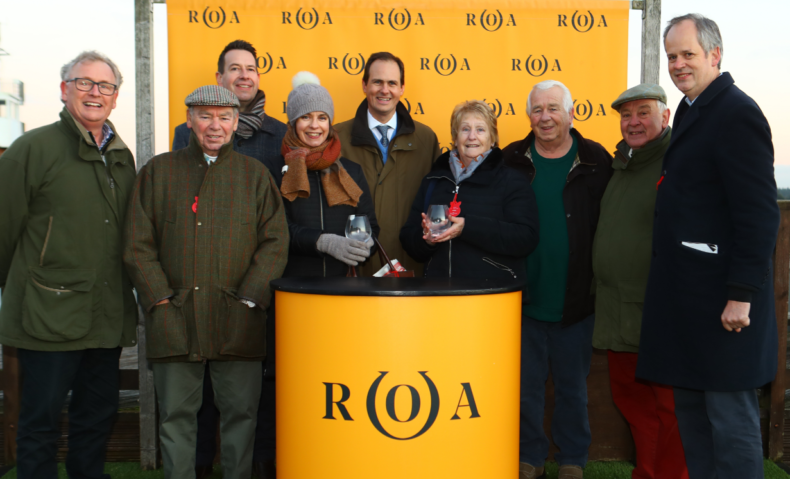 Race 8 - Charlie Liverton with the Hawk Inn Syndicate after Red Rookie's win in the bumper.PNG